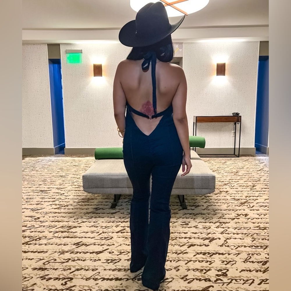 Low cut open back denim jumpsuit